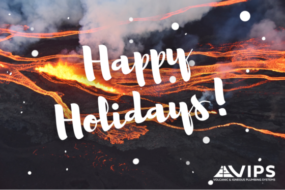 A photograph of an active lave flow from Mauna Loa (Hawaii) with text reading 'Happy Holidays!' in white over the top.
